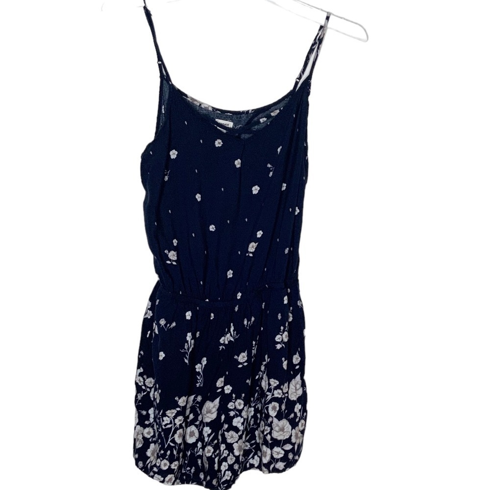 GARAGE navy blue, floral romper with back cutout. Size XS